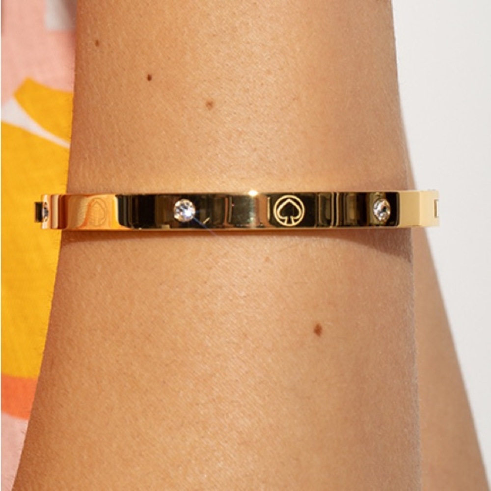 Kate Spade “Infinite” Hinge Goldtone Bracelet